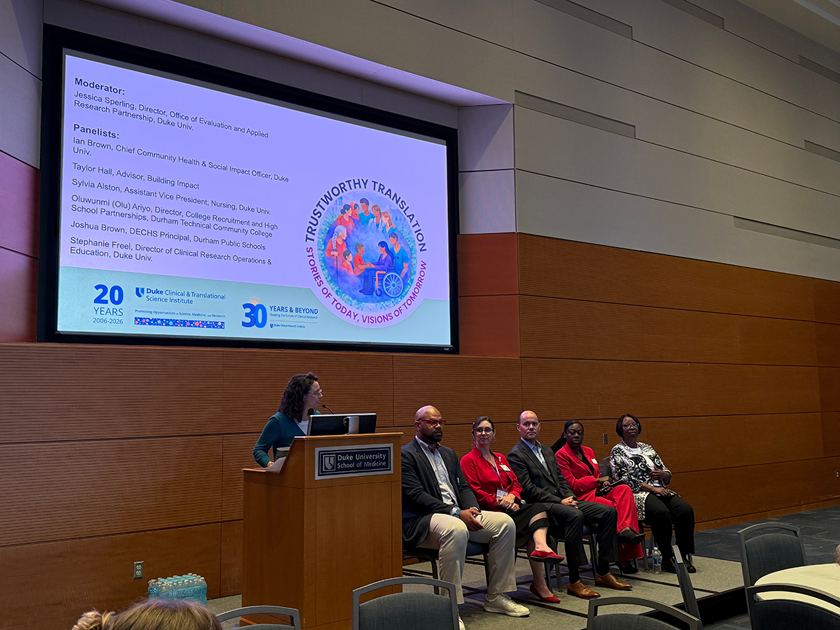 Panel sitting on a dias 