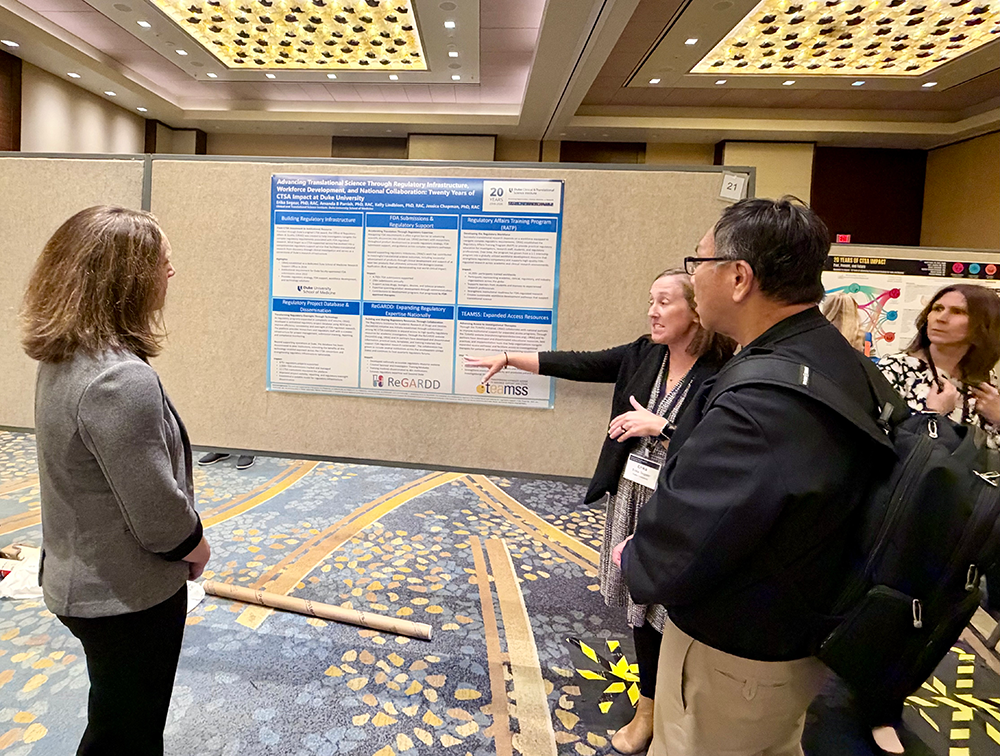 Duke delegate presenting her poster