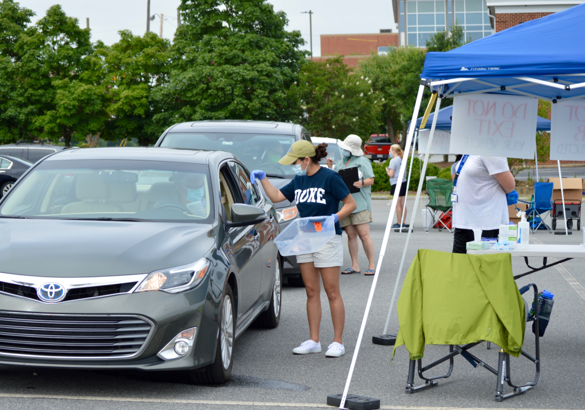 team member collecting samples 