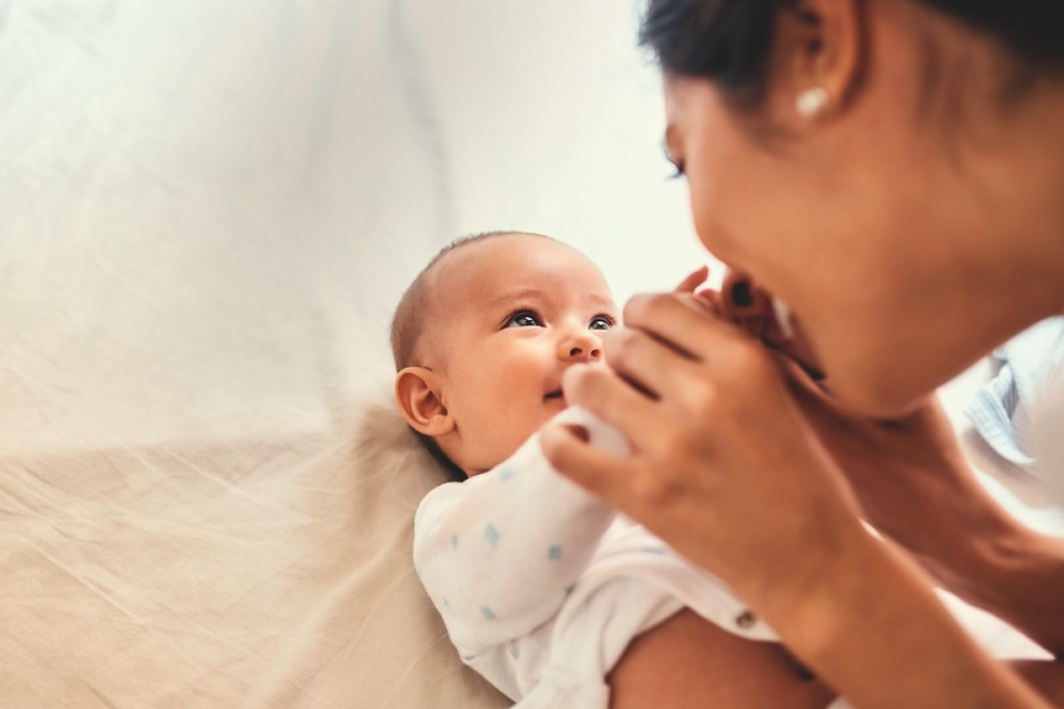 baby and mother looking at each other