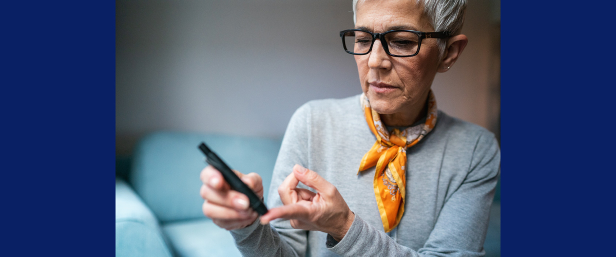 Photo of woman checking her blood sugar