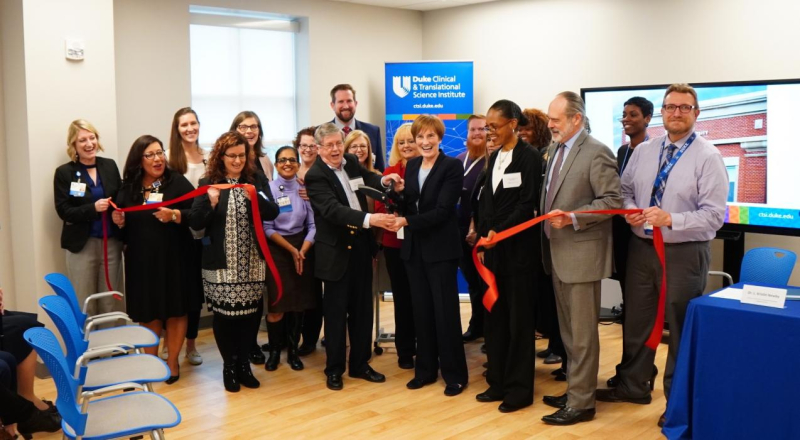 TransPop staff cutting the ribbon on the new research campus space