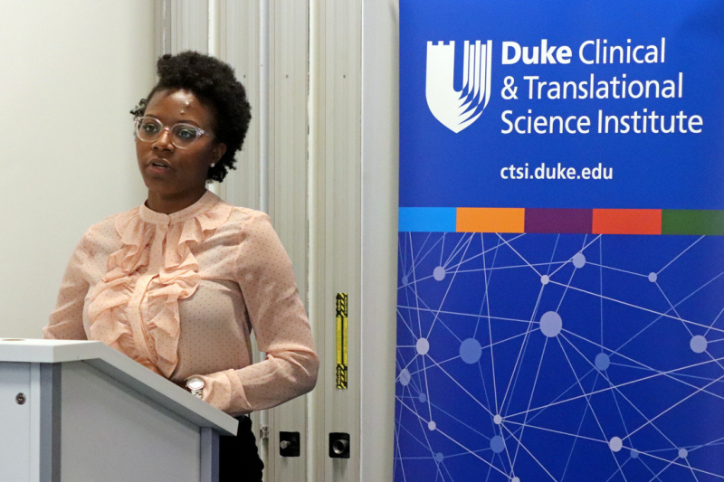 Paris Rutherford presenting during the summer 2022 Duke-NCCU Bridge Office Internship Program reception