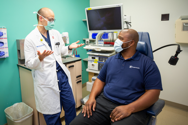 PREVENT II clinical researcher speaking with a research participant in a clinic