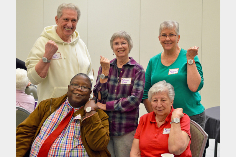 Study participants posing with their wearable devices