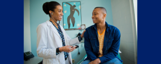 doctor standing next to a patient