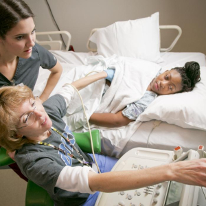 A patient receiving a cardiac ultrasound at Duke