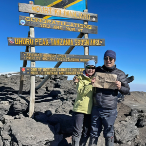 Shelley Hwang and husband on top of Mt. Kilimanjaro